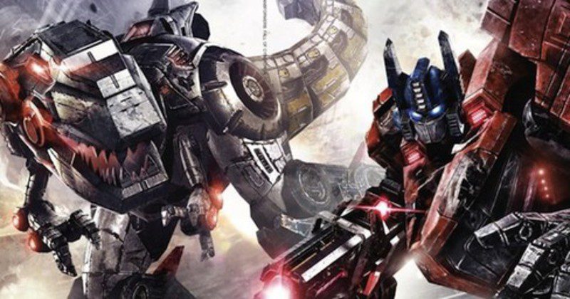 Optimus Prime y Grimlock, con pose de combate